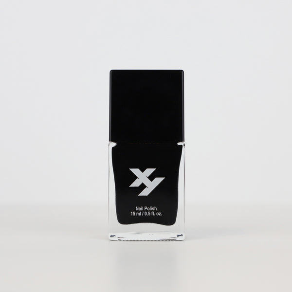 Front view of a bottle of Arcane X nail polish