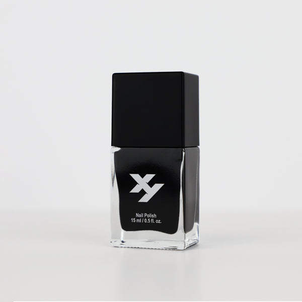 Side view of a bottle of Arcane X nail polish