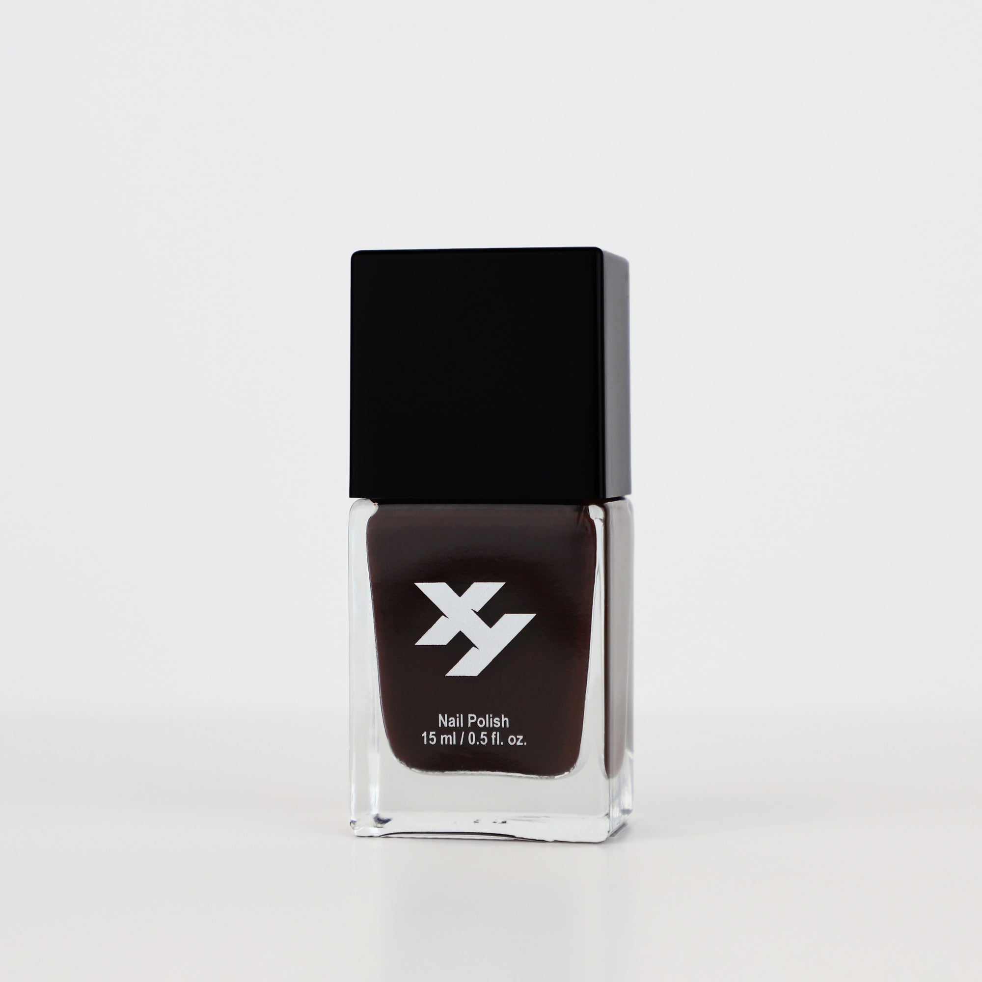 Side view of a bottle of Rooted X nail polish.